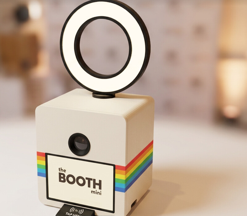 Booth Mini in white with a rainbow stripe