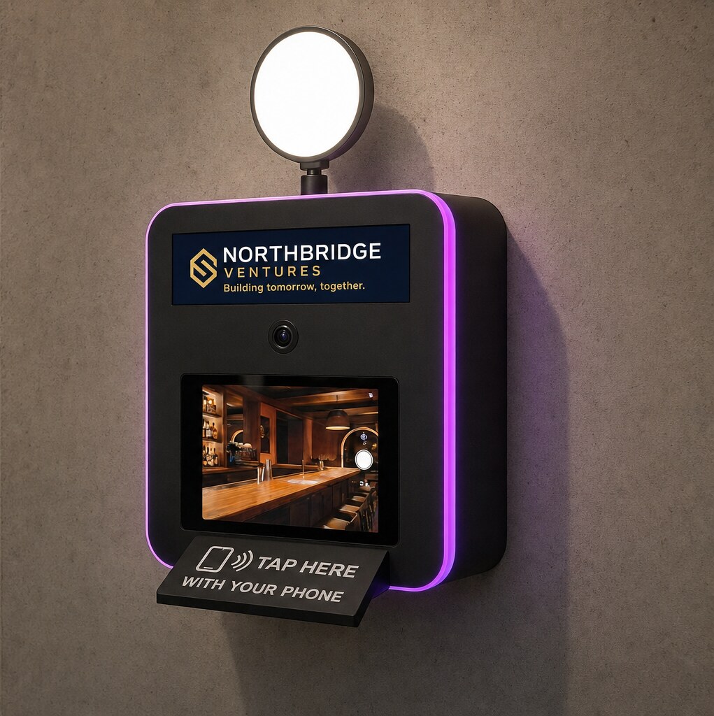 A Booth Mini mounted on a concrete wall with a lit edge